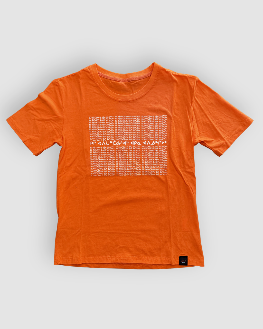 Orange t-shirt with a graphic design on a white background