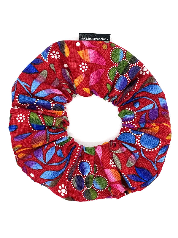 Colorful scrunchie with floral pattern on a white background