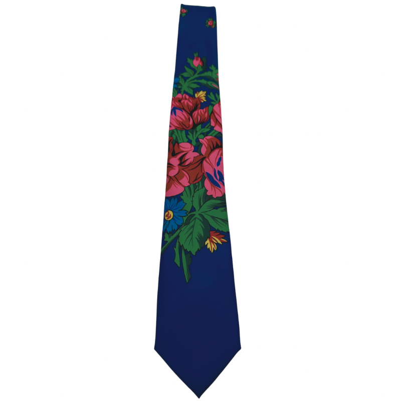 A royal blue necktie with a white floral pattern.