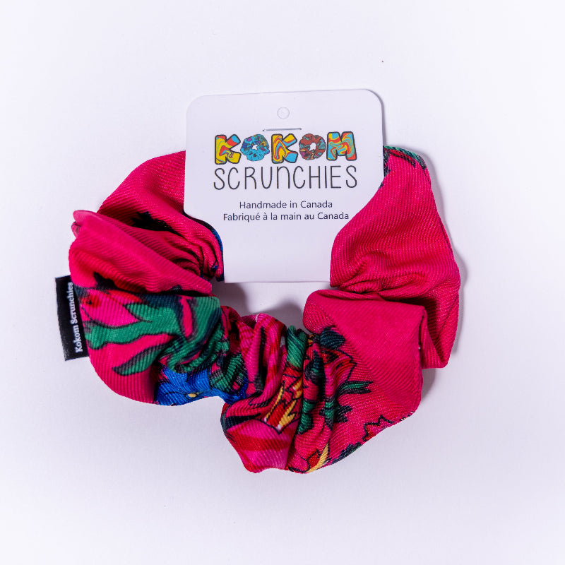 Colorful scrunchies on a white background with &
