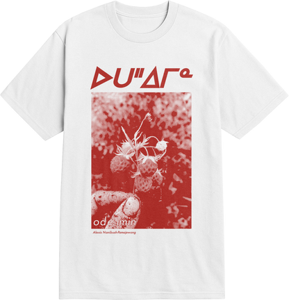 White t-shirt with red graphic design and red text syllabics on a white background