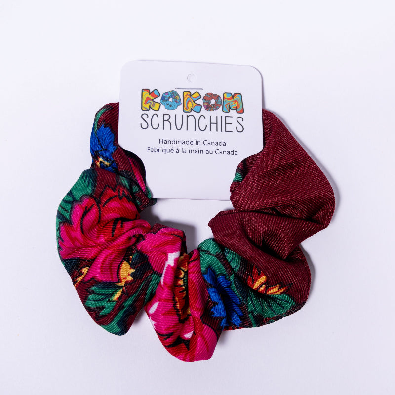 Colorful scrunchies on a white background with &